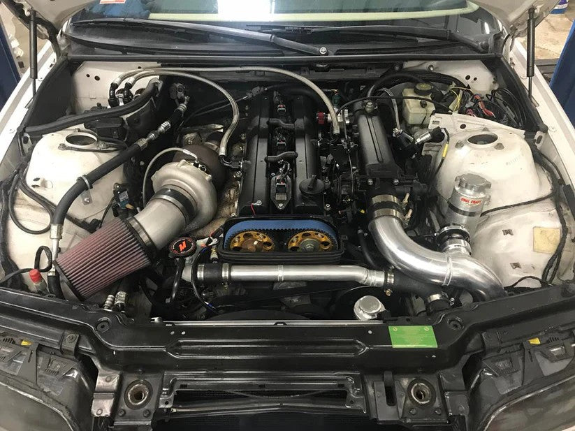 Fe - 2JZ E36 engine mount kit showing CNC cut steel brackets for 1JZ and 2JZ swaps in BMW E36