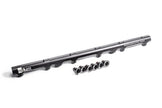 Radium Engineering high flow black anodized aluminum fuel rail for Toyota 2JZ-GE engine with 8AN ORB ports